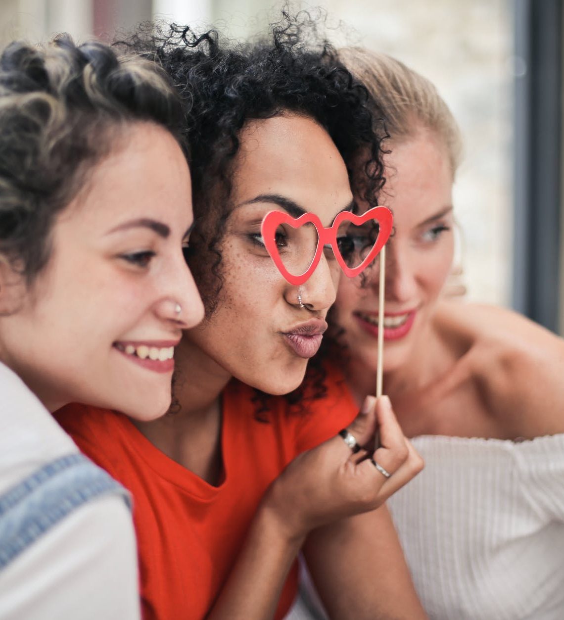 three women posing for photo