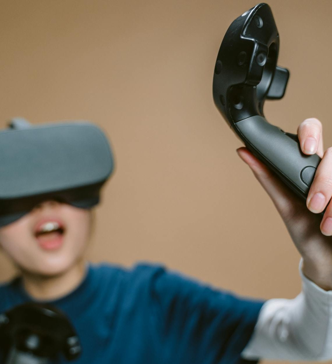 a woman playing a virtual reality game